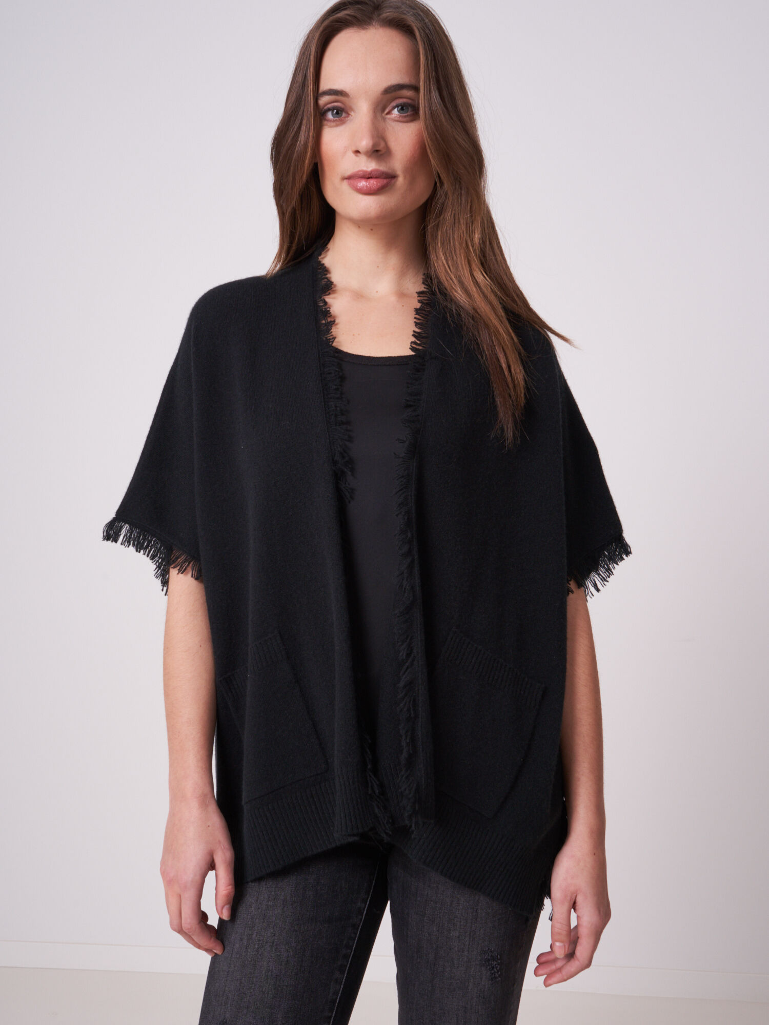 Poncho cape met franjes